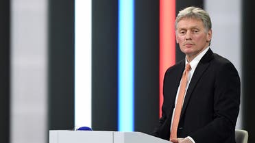 Kremlin spokesman Dmitry Peskov moderates Russian President Vladimir Putin's annual press conference at the Manezh exhibition hall in central Moscow on December 23, 2021. (AFP)