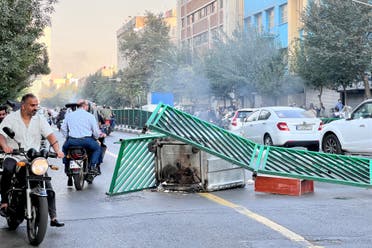 من الاحتجاجات في طهران تنديدا بموت مهسا أميني (أرشيفية- فرانس برس)