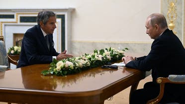 Russian President Vladimir Putin meets with Rafael Grossi, director of the UN’s International Atomic Energy Agency (IAEA), in Saint Petersburg on October 11, 2022. (Sputnik/AFP)