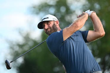Dustin Johnson tees off from the 18th tee box during the final round of the Invitational Chicago LIV Golf tournament at Rich Harvest Farms. (Reuters)