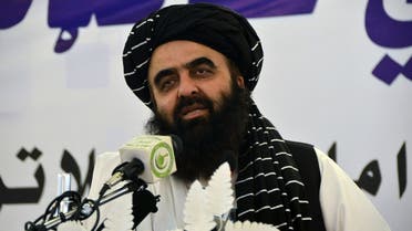 Afghanistan’s Foreign minister Amir Khan Muttaqi speaks of economic welfare during a public meeting held at a private salon in the second district of Kandahar on August 18, 2022. (AFP)
