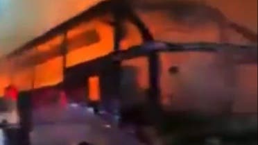 A screen grab from  a video showing a bus fire that left at least 18 Pakistanis, including 12 children, dead as they journeyed home after fleeing catastrophic monsoon flooding. (Twitter)