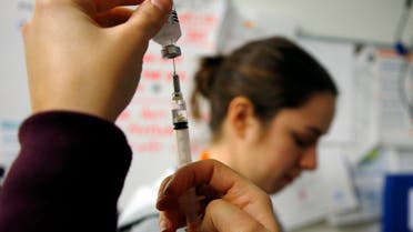 Nurses prepare influenza vaccine injections during a flu shot clinic at Dorchester House, a health care clinic, in Boston, Massachusetts January 12, 2013. (File photo: Reuters)