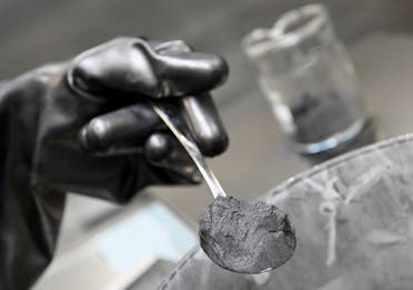 Graphite powder, used for battery paste, is pictured in a Volkswagen pilot line for battery cell production in, Germany, May 18, 2022. (Reuters)