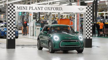 Britain's Prince Charles drives a MINI electric car during a visit to the MINI plant in Oxford, Britain June 8, 2021. (File photo: Reuters)