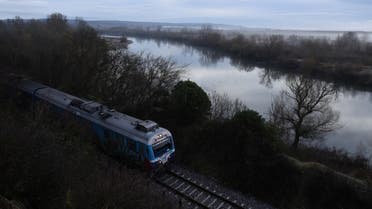 Train passes next to the Evros river, the natural border between Greece and Turkey, near the city of Didymoteicho, in the region of Evros