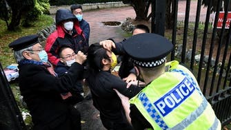 UK police investigate beating of protester on China consulate grounds in Manchester