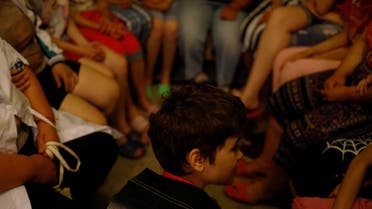 Orphaned Ukrainian children sit in a basement shelter after an air raid warning went off, at a facility for people with special needs, amid Russia's invasion of Ukraine, in Odesa, Ukraine, June 6, 2022. (File photo: Reuters)