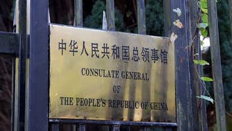 Britain summons Chinese diplomat over beating of protester at consulate