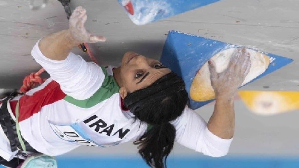 Iranian Climber Who Competed Without Hijab Back In Tehran