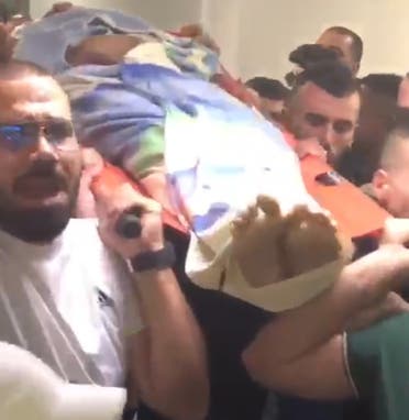 مقتل فلسطيني بالرصاص خلال مداهمة الجيش الإسرائيلي لجنين - بوابة مشاهير 1 جثة الشاب الذي قتل في المواجهات