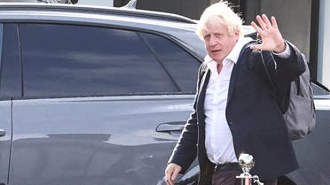 Former British Prime Minister Boris Johnson walks, at Gatwick Airport, near London, Britain, on October 22, 2022. (Reuters)