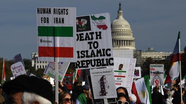 Protesters march in solidarity with protesters in Iran on the National Mall in Washington, DC, on October 22, 2022. (AFP)