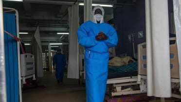 A member of the Ugandan Medical staff of the Ebola Treatment Unit stands inside the ward in Personal Protective Equipment (PPE) at Mubende Regional Referral Hospital in Uganda on September 24, 2022. (AFP)