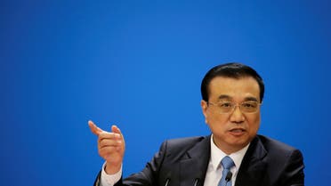 FILE PHOTO: Chinese Premier Li Keqiang speaks at the news conference following the closing session of the National People's Congress (NPC), at the Great Hall of the People in Beijing, China March 20, 2018. REUTERS/Jason Lee/File Photo