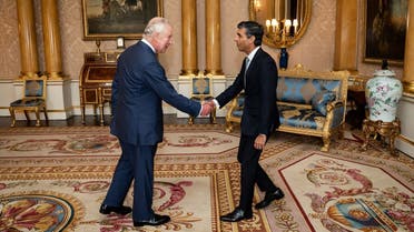 Britain’s King Charles III greets newly appointed Conservative Party leader and incoming Prime Minister Rishi Sunak during an audience at Buckingham Palace in London on October 25, 2022, where Sunak was invited to form a government. (AFP)