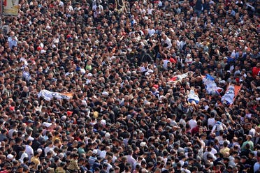 Mourners attend the funeral of Palestinians killed in an overnight Israeli raid, in the occupied West Bank city of Nablus on October 25, 2022. (AFP)