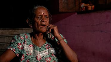 Arumuga Lakshmi, whose son and daughter went missing during Sri Lanka's civil war, reacts during an interview at her home in Vavuniya, Northern Province, Sri Lanka, August 11, 2022. (Reuters)