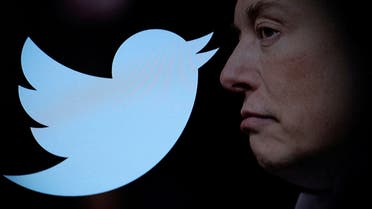  Twitter logo and a photo of Elon Musk are displayed through magnifier in this illustration taken October 27, 2022. (Reuters)