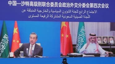 Saudi Arabia’s Minister of Foreign Affairs Prince Faisal bin Farhan chairs a virtual meeting with his Chinese counterpart Wang Yi. (Twitter)