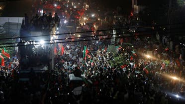 Supporters of Pakistan's former prime minister Imran Khan gather during what they call 'a true freedom march', to pressure the government to announce new elections, in Lahore, Pakistan October 28, 2022. (Reuters)
