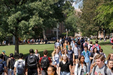  Students walk through the campus of the University of North Carolina at Chapel Hill, North Carolina, US. (Reuters)