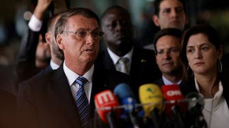 Brazil’s Bolsonaro vows to follow constitution, orders transition to Lula