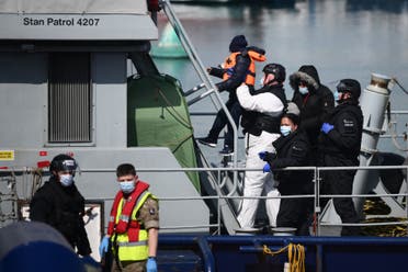 Refugees arrived in Britain (AFP)