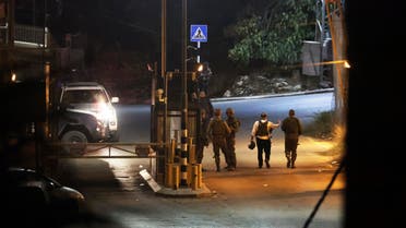 Israeli security forces patrol an area of a gun attack near urban Israeli settlement on the outskirts of Hebron, in the southern West Bank. (File: AFP)