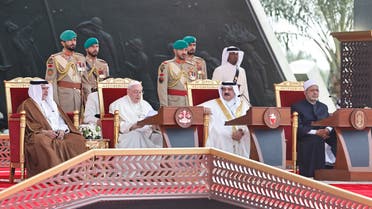 Bahrain's Crown Prince and Prime Minister Salman bin Hamad Al Khalifa, Pope Francis, Bahrain's King Hamad bin Isa Al Khalifa and Grand Imam of Al-Azhar Ahmed Al-Tayeb attend the Bahrain Forum for Dialogue: East and West for Human Coexistence at Al-Fida' Square of Sakhir Royal Palace during Pope Francis' apostolic journey, south of Manama, Bahrain, November 4, 2022. (Reuters)