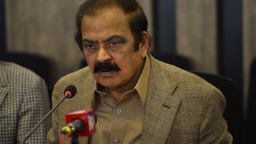 Pakistan Interior Minister Rana Sanaullah (C) speaks during a press conference in Islamabad on May 24, 2022. Pakistani police detained hundreds of supporters of ousted prime minister Imran Khan's Pakistan Tehreek-e-Insaf party ahead of a major sit-in planned by the former leader, senior party members and police sources said on May 24. (Photo by Farooq NAEEM / AFP)