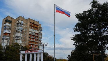 A Russian flag flies in a square in Melitopol REUTERS