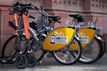Circ e-scooters and rental bikes are ready to use outside the tourist information office next to the townhall Roemer in Frankfurt, Germany, August 8, 2019. (Reuters)