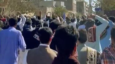 This image grab from a UGC video made available on October 14, 2022, shows Iranian protesters chanting slogans as they march in a street in the southeastern city of Zahedan. (File: AFP)
