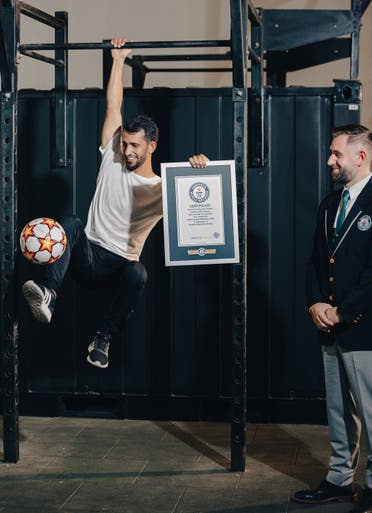 In Dubai, famous regional football freestyler, Ammar Alkhudairi  - also known as ‘Ammar Freez’ – displayed his own impressive ball skills by breaking two Guinness World Records titles for the Most consecutive football touches while hanging with one hand in 30 seconds, in which he achieved 87 football touches. (Supplied)