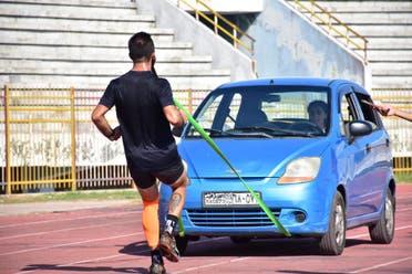 From Syria, athlete Yazan Saleh attempted two stunts for the Fastest 30 m car pull with the teeth (male) – 18.13 seconds, breaking the previous record – 18.42 seconds – with less than half a second. (Supplied)