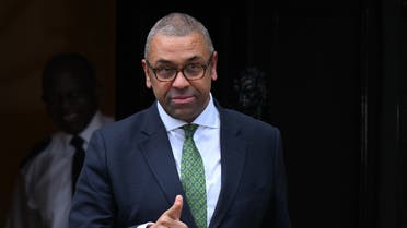 Britain’s newly re-appointed Foreign Secretary James Cleverly leaves after a meeting with Britain’s newly appointed Prime Minister Rishi Sunak at 10 Downing Street in central London, on October 25, 2022. (AFP)