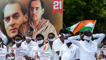Congress party activists and supporters participate in a demonstration to protest against the release of a man jailed over the assassination of former prime minister Rajiv Gandhi at his memorial in Sriperumbudur on May 19, 2022. (AFP)