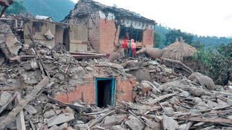 Woman killed in landslide after two earthquakes rattle Nepal