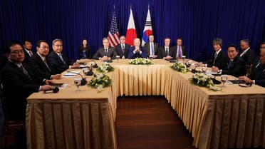 US President Joe Biden holds a trilateral meeting with Japanese Prime Minister Fumio Kishida and South Korean President Yoon Suk-yeol in Phnom Penh, Cambodia, on November 13, 2022. (Reuters)