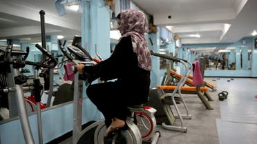 a 20-year-old Afghan woman rides a stationary bicycle at the women's gym in Kabul, Afghanistan June 19, 2019. Picture taken June 19, 2019. (File photo: Reuters)