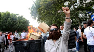 A protester raises her hand during a pro-reform demonstration in central Tehran. (File photo: Reuters)