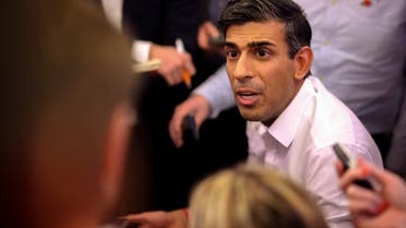 British Prime Minister Rishi Sunak holds a huddle news conference with political journalists aboard a government plane inflight to Indonesia to attend the G20 meeting, November 13, 2022. (Reuters)