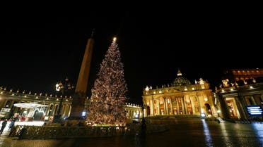 The Vatican Christmas tree is seen lit during a ceremony in St. Peter's Square, with protocols in place due to the coronavirus disease (COVID-19), at the Vatican, December 11, 2020. (Reuters)