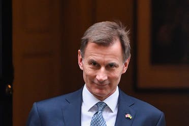 Britain’s Chancellor of the Exchequer Jeremy Hunt walks at Downing Street in London, Britain, on November 17, 2022. (Reuters)