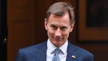 Britain’s Chancellor of the Exchequer Jeremy Hunt walks at Downing Street in London, Britain, on November 17, 2022. (Reuters)