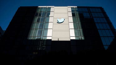 FILE - A Twitter logo hangs outside the company's San Francisco offices on Tuesday, Nov. 1, 2022. Reacting to the tumult and mass layoffs at Twitter under its new owner Elon Musk, a group of Democratic senators on Thursday, Nov. 17, 2022, asked federal regulators to investigate any possible violations by the platform of consumer-protection laws or of its data-security commitments. (AP Photo/Noah Berger, File)