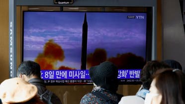 People watch a TV broadcasting a news report, on North Korea firing a ballistic missile off its east coast, in Seoul. (Reuters)