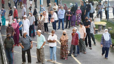 People queue to cast their vote during the country’s general election at Permatang Pauh, Penang, Malaysia November 19, 2022. (Reuters)