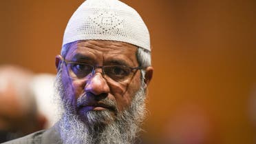 Controversial Indian Islamic preacher Zakir Naik arrives during the opening ceremony of the Kuala Lumpur Summit 2019 in Kuala Lumpur on December 19, 2019. (AFP)
